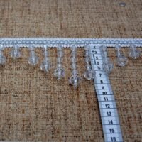 Dekoras užuolaidoms baltos spalvos skaidrus kutai 9 cm