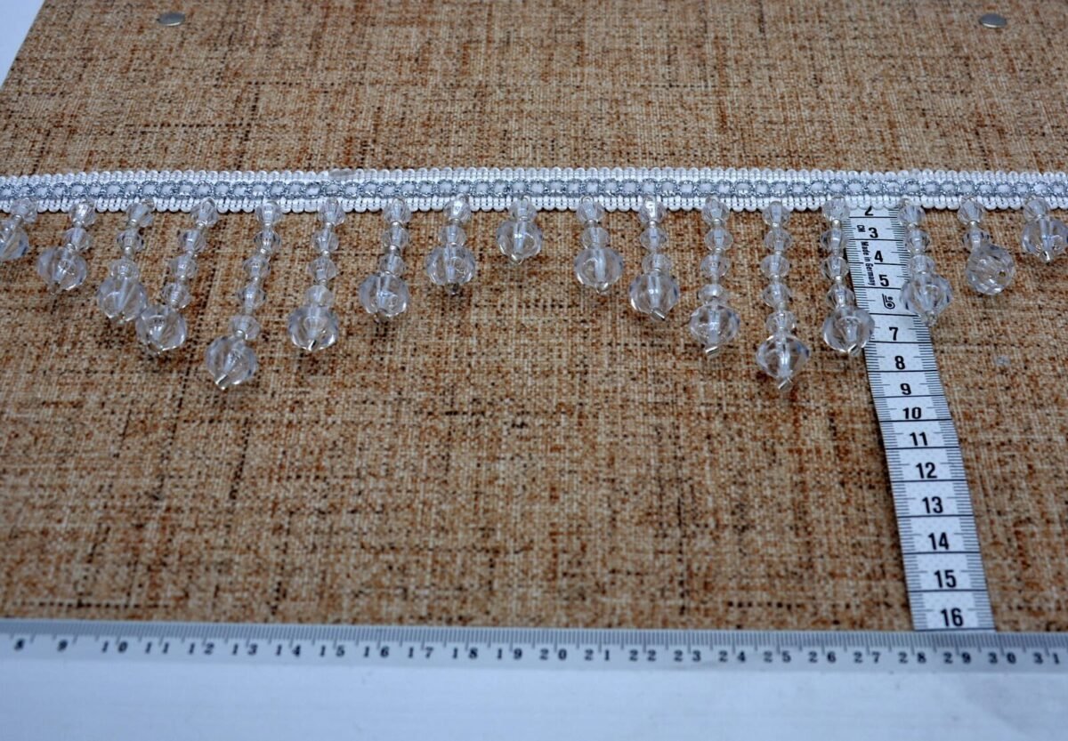 Dekoras užuolaidoms baltos spalvos skaidrus kutai 9 cm