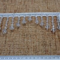 Dekoras užuolaidoms baltos spalvos skaidrus kutai 9 cm