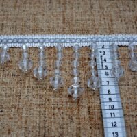 Dekoras užuolaidoms baltos spalvos skaidrus kutai 9 cm